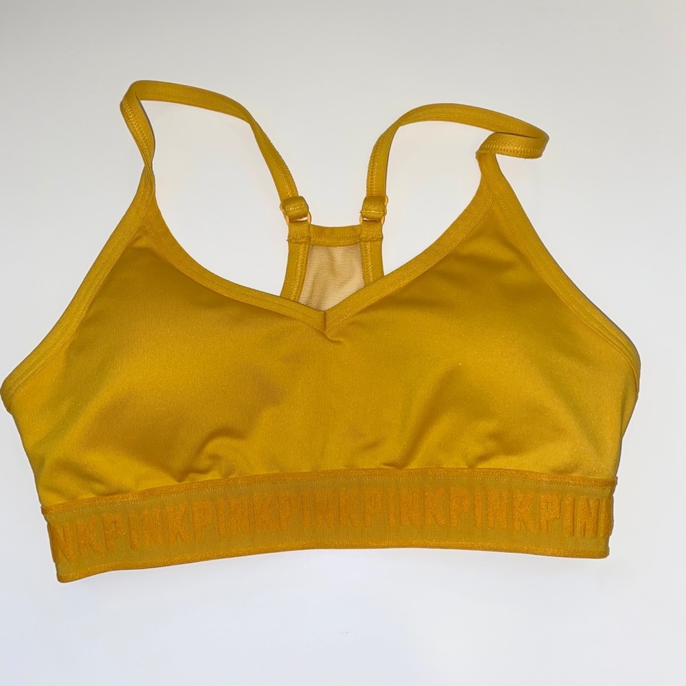 Pink Victoria’s Secret sports bra